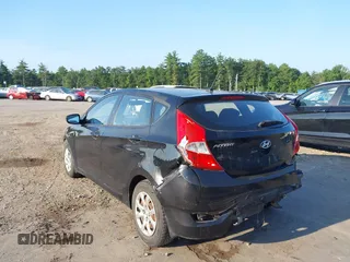 2013 Hyundai Accent GS with VIN KMHCT5AE7DU083576, listed as a IAAI auction lot 42693108 with 100,741 mi miles and . Bid and sale history available at DreamBid. Image 3.