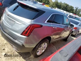 2023 Cadillac XT5 FWD Luxury z VIN 1GYKNAR4XPZ144533, wystawiony jako Copart lot #74734164 z przebiegiem Nie podano mil oraz Nie do naprawy • Non repairable. Historia ofert i sprzedaży dostępna na DreamBid. Obrazek 3.