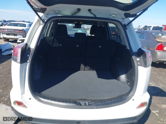2017 Toyota RAV4 LE with VIN JTMZFREV8HJ111318, listed as a IAAI auction lot 41649660 with 117,018 mi miles. Bid and sale history available at carsss.com. Image 16.