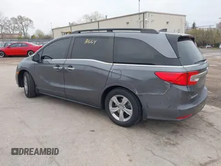 2018 Honda Odyssey EX-L with VIN 5FNRL6H72JB076597, listed as a IAAI auction lot 41838664 with 154,647 mi miles and . Bid and sale history available at DreamBid. Image 3.