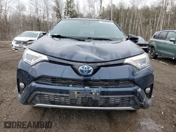 2018 Toyota RAV4 Hybrid SE with VIN JTMJJREV6JD225530, listed as a Copart auction lot 52000985 with 150,642 mi miles and Salvage title. Bid and sale history available at DreamBid. Image 5.