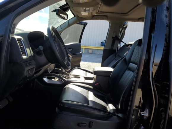 2022 Nissan Frontier S with VIN 1N6ED1EK4NN656008, listed as a Copart auction lot 57946915 with 25,607 mi miles and Salvage title. Bid and sale history available at DreamBid. Image 7.
