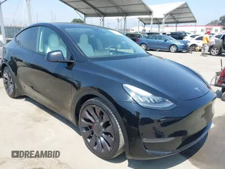 2021 Tesla Model Y Performance z VIN 5YJYGDEF1MF092889, wystawiony jako IAAI lot #42451289 z przebiegiem 48 409 mil mil oraz . Historia ofert i sprzedaży dostępna na DreamBid. Obrazek 1.