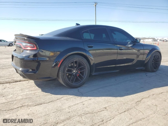 2020 Dodge Charger Scat Pack with VIN 2C3CDXGJ9LH164750, listed as a Copart auction lot 49712175 with 42,400 mi miles and Salvage Title. Bid and sale history available at carsss.com. Image 3.