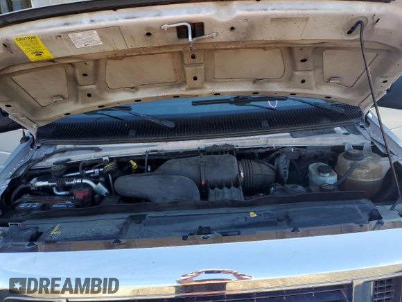 2010 Ford Econoline Passenger XL with VIN 1FMNE1BW3ADA25124, listed as a Copart auction lot 56899235 with 244,010 mi miles and Salvage title. Bid and sale history available at DreamBid. Image 12.