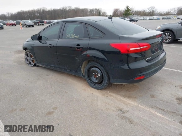 2017 Ford Focus SE with VIN 1FADP3FE4HL307110, listed as a IAAI auction lot 41992037 with 54,380 mi miles and . Bid and sale history available at DreamBid. Image 3.