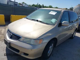 2001 Honda Odyssey EX with VIN 2HKRL18681H530346, listed as a IAAI auction lot 42371126 with 211,604 mi miles and . Bid and sale history available at DreamBid. Image 2.