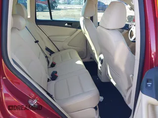 2012 Volkswagen Tiguan S with VIN WVGBV7AX2CW078629, listed as a IAAI auction lot 41332445 with 94,239 mi miles and . Bid and sale history available at DreamBid. Image 8.