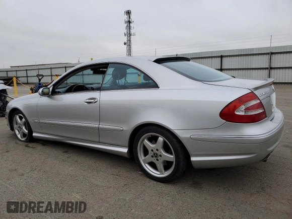 2004 Mercedes-Benz CLK 500 with VIN WDBTJ75J04F110990, listed as a Copart auction lot 85511414 with 251,096 mi miles and Salvage title. Bid and sale history available at DreamBid. Image 2.