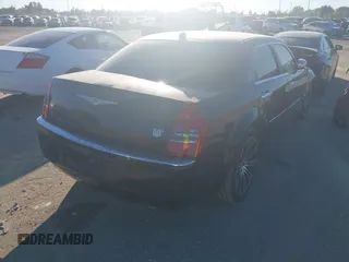 2006 Chrysler 300 C with VIN 2C3LA63H56H246663, listed as a IAAI auction lot 40894432 with 145,629 mi miles. Bid and sale history available at carsss.com. Image 4.