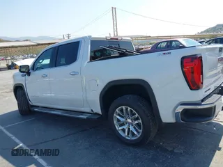 2022 GMC Sierra 1500 SLT with VIN 3GTU9DED3NG156904, listed as a IAAI auction lot 42429722 with 59,717 mi miles and . Bid and sale history available at DreamBid. Image 13.