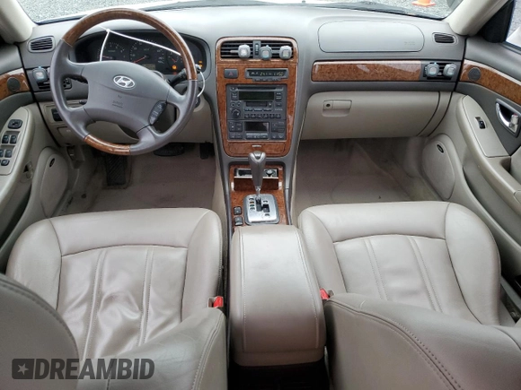 2004 Hyundai XG z VIN KMHFU45E74A301113, wystawiony jako Copart lot #46635495 z przebiegiem 104 776 mil mil oraz Szkoda całkowita • Salvage title. Historia ofert i sprzedaży dostępna na DreamBid. Obrazek 8.