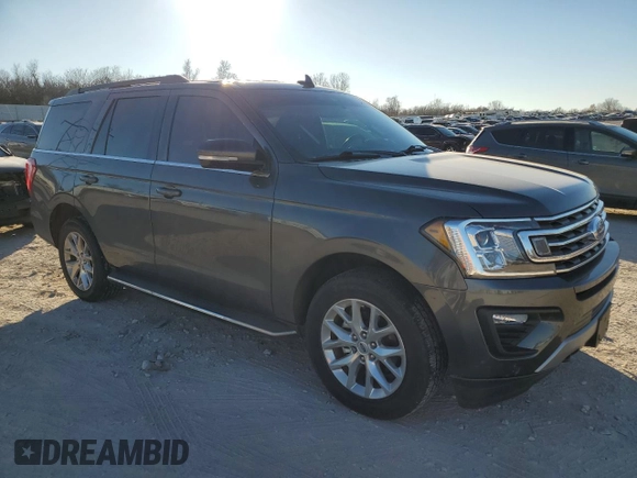 2021 Ford Expedition XLT with VIN 1FMJU1JT0MEA20759, listed as a Copart auction lot 86129234 with 82,687 mi miles and Salvage Title. Bid and sale history available at carsss.com. Image 4.