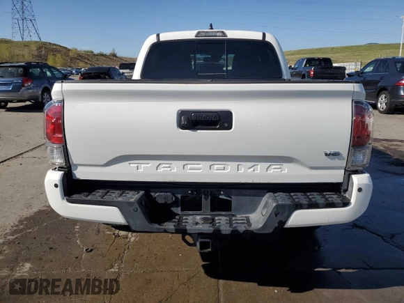 2023 Toyota Tacoma SR z VIN 3TMCZ5AN5PM647530, wystawiony jako Copart lot #54549125 z przebiegiem 8 992 mil mil oraz Szkoda całkowita • Salvage title. Historia ofert i sprzedaży dostępna na DreamBid. Obrazek 6.