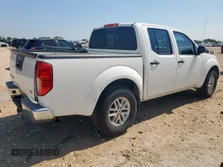 2015 Nissan Frontier SV with VIN 1N6AD0ER8FN709073, listed as a Copart auction lot 57821555 with 191,708 mi miles and Salvage title. Bid and sale history available at DreamBid. Image 3.