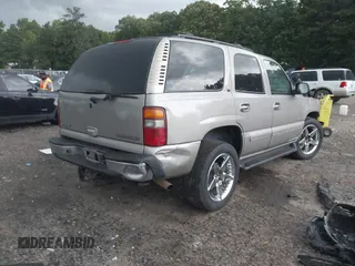 2002 Chevrolet Tahoe LT with VIN 1GNEC13Z62J233110, listed as a IAAI auction lot 42460607 with 329,196 mi miles and . Bid and sale history available at DreamBid. Image 4.