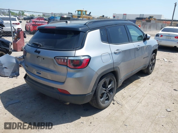 2018 Jeep Compass Latitude with VIN 3C4NJDBB3JT304145, listed as a IAAI auction lot 42008241 with 52,642 mi miles and . Bid and sale history available at DreamBid. Image 4.