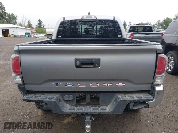 2020 Toyota Tacoma SR5 z VIN 3TMCZ5AN8LM323918, wystawiony jako IAAI lot #42279462 z przebiegiem 105 923 mil mil oraz . Historia ofert i sprzedaży dostępna na DreamBid. Obrazek 16.
