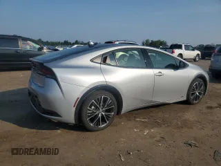 2024 Toyota Prius LE with VIN JTDADABU8R3020720, listed as a Copart auction lot 60815005 with 2,594 mi miles and Salvage title. Bid and sale history available at DreamBid. Image 3.