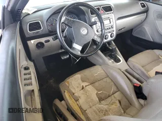 2007 Volkswagen Eos 2.0T with VIN WVWDA71FX7V044241, listed as a Copart auction lot 71100934 with 155,308 mi miles and Salvage Title. Bid and sale history available at DreamBid. Image 8.