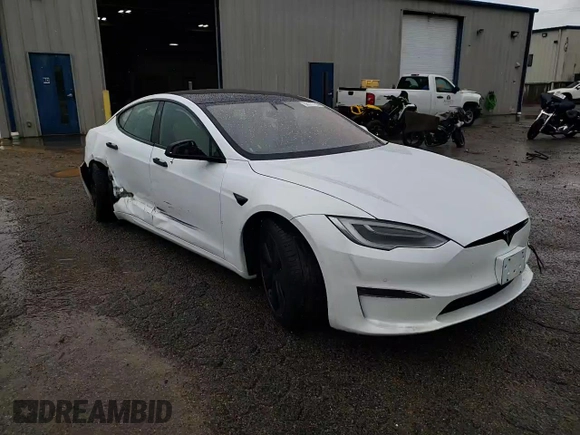 2021 Tesla Model S Long Range z VIN 5YJSA1E5XMF439827, wystawiony jako Copart lot #56117755 z przebiegiem Nie podano mil oraz Szkoda całkowita • Salvage title. Historia ofert i sprzedaży dostępna na DreamBid. Obrazek 13.