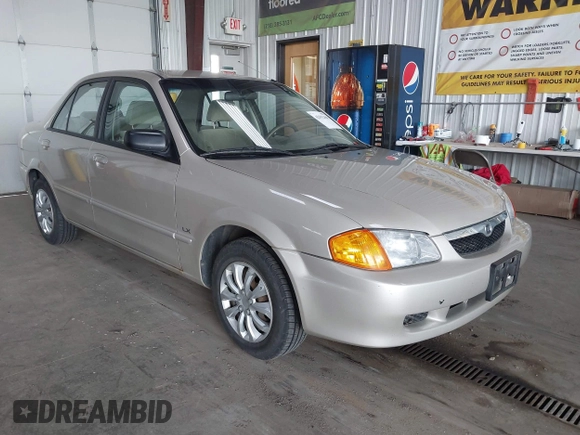 2000 Mazda Protege DX with VIN JM1BJ2221Y0239987, listed as a IAAI auction lot 42092488 with 140,756 mi miles and . Bid and sale history available at DreamBid. Image 1.