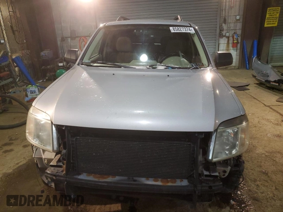 2008 Mercury Mariner with VIN 4M2CU39H78KJ28676, listed as a Copart auction lot 85827374 with 170,534 mi miles and Salvage title. Bid and sale history available at DreamBid. Image 5.