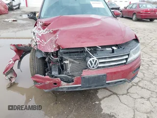 2018 Volkswagen Tiguan S with VIN 3VV1B7AX9JM085312, listed as a IAAI auction lot 41656827 with 122,322 mi miles and . Bid and sale history available at DreamBid. Image 6.