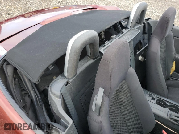 2006 Mazda MX-5 Miata Touring z VIN JM1NC25F260121773, wystawiony jako Copart lot #55887175 z przebiegiem Nie podano mil oraz Szkoda całkowita • Salvage title. Historia ofert i sprzedaży dostępna na DreamBid. Obrazek 10.