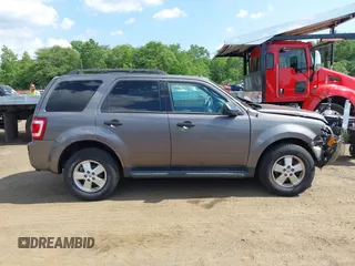 2012 Ford Escape XLT with VIN 1FMCU9D75CKC22907, listed as a IAAI auction lot 42571195 with 198,537 mi miles and . Bid and sale history available at DreamBid. Image 13.