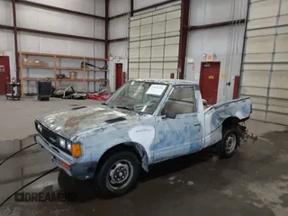 1982 Datsun 720 z VIN JN6MD01S7CW103064, wystawiony jako IAAI lot #41831434 z przebiegiem 175 954 mil mil oraz . Historia ofert i sprzedaży dostępna na DreamBid. Obrazek 2.