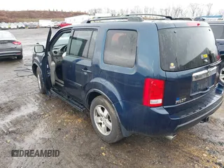 2009 Honda Pilot EX-L with VIN 5FNYF48699B055062, listed as a IAAI auction lot 41967409 with 300,781 mi miles and . Bid and sale history available at carsss.com. Image 3.