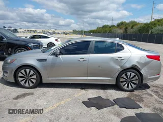 2012 Kia Optima SX with VIN 5XXGR4A67CG066935, listed as a IAAI auction lot 41989589 with 80,420 mi miles and . Bid and sale history available at carsss.com. Image 14.