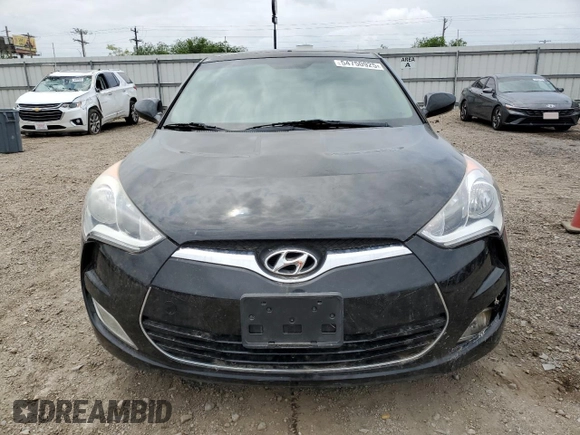 2014 Hyundai Veloster z VIN KMHTC6AD0EU188863, wystawiony jako Copart lot #54750925 z przebiegiem 96 212 mil mil oraz Szkoda całkowita • Salvage title. Historia ofert i sprzedaży dostępna na DreamBid. Obrazek 5.