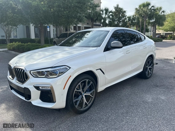 2020 BMW X6 M50i with VIN 5UXCY8C03L9B98266, listed as a Copart auction lot 54259735 with 44,544 mi miles and Clean Title. Bid and sale history available at carsss.com. Image 2.