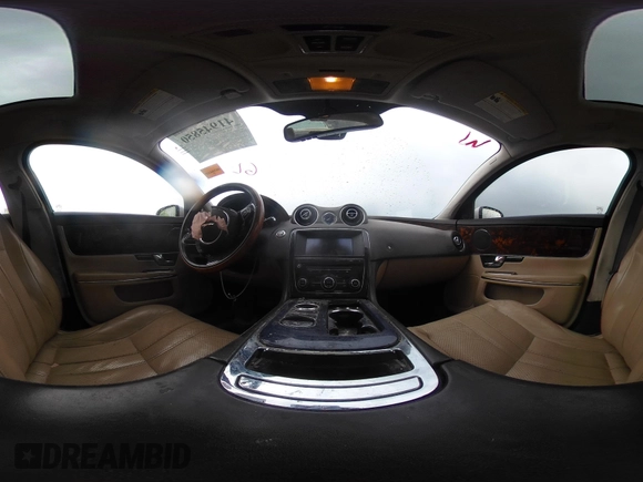 2012 Jaguar XJ with VIN SAJWA1CB7CLV35339, listed as a IAAI auction lot 41945850 with 123,501 mi miles and . Bid and sale history available at DreamBid. Image 20.