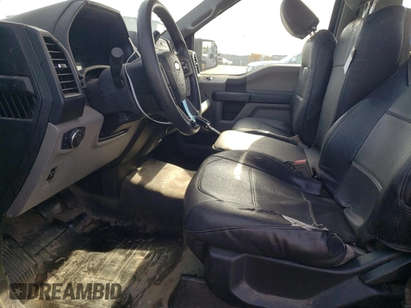 2018 Ford F-150 XL with VIN 1FTMF1EP0JKC60951, listed as a Copart auction lot 77759594 with 152,604 mi miles and Salvage title. Bid and sale history available at DreamBid. Image 7.