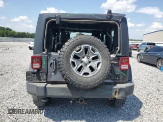2017 Jeep Wrangler Rubicon with VIN 1C4BJWCG0HL675472, listed as a Copart auction lot 62751365 with 86,338 mi miles and Salvage title. Bid and sale history available at DreamBid. Image 6.