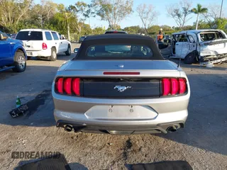 2020 Ford Mustang EcoBoost with VIN 1FATP8UH6L5138744, listed as a IAAI auction lot 41264200 with 55,408 mi miles and . Bid and sale history available at carsss.com. Image 16.