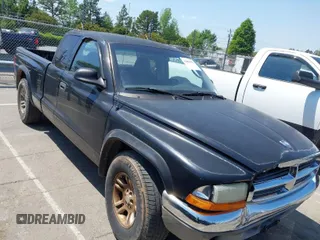 2004 Dodge Dakota SLT with VIN 1D7GL42N14S527342, listed as a IAAI auction lot 42081956 with 165,157 mi miles. Bid and sale history available at carsss.com. Image 1.