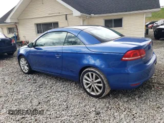 2012 Volkswagen Eos Komfort with VIN WVWBW7AH7CV000878, listed as a Copart auction lot 54667185 with 121,413 mi miles and Clean Title. Bid and sale history available at DreamBid. Image 2.