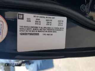 2006 Cadillac DTS 1SB z VIN 1G6KD57Y56U220535, wystawiony jako Copart lot #89196185 z przebiegiem 94 312 mil mil oraz Szkody całkowita. Historia ofert i sprzedaży dostępna na DreamBid. Obrazek 12.