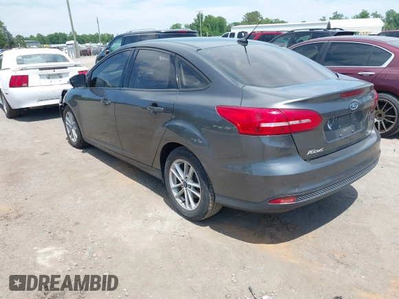 2018 Ford Focus SE with VIN 1FADP3FE2JL227679, listed as a IAAI auction lot 42296608 with 128,269 mi miles and . Bid and sale history available at DreamBid. Image 3.