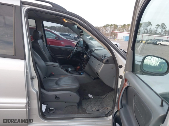 1999 Mercedes-Benz M-Class with VIN 4JGAB72EXXA131890, listed as a IAAI auction lot 41721001 with 168,969 mi miles. Bid and sale history available at carsss.com. Image 5.