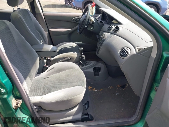 2002 Ford Focus ZX5 z VIN 3FAFP373X2R130965, wystawiony jako IAAI lot #42216638 z przebiegiem 59 236 mil mil oraz . Historia ofert i sprzedaży dostępna na DreamBid. Obrazek 5.