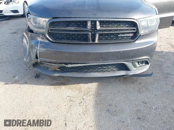 2015 Dodge Durango R/T with VIN 1C4SDHCT8FC833943, listed as a IAAI auction lot 41898447 with 209,999 mi miles and . Bid and sale history available at DreamBid. Image 6.