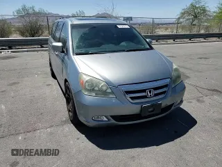 2005 Honda Odyssey Touring z VIN 5FNRL38805B131416, wystawiony jako Copart lot #59157395 z przebiegiem 263 087 mil mil oraz Szkoda całkowita • Salvage title. Historia ofert i sprzedaży dostępna na DreamBid. Obrazek 14.