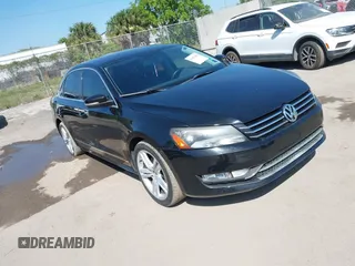 2015 Volkswagen Passat 1.8T SE w/Sunroof & Nav with VIN 1VWBT7A34FC040166, listed as a IAAI auction lot 41852383 with 142,852 mi miles. Bid and sale history available at carsss.com. Image 1.