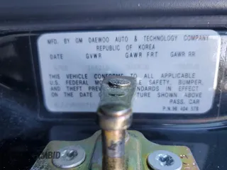 2007 Suzuki Forenza z VIN KL5JD56Z27K530714, wystawiony jako Copart lot #73358864 z przebiegiem 127 196 mil mil oraz Szkody całkowita. Historia ofert i sprzedaży dostępna na DreamBid. Obrazek 14.