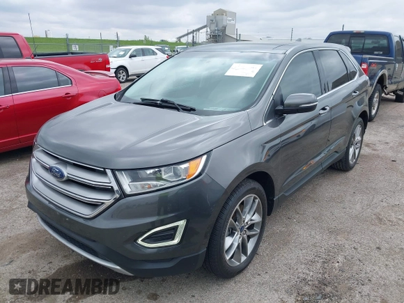 2015 Ford Edge Titanium z VIN 2FMTK3K81FBB88882, wystawiony jako IAAI lot #42184698 z przebiegiem 161 858 mil mil oraz . Historia ofert i sprzedaży dostępna na DreamBid. Obrazek 17.